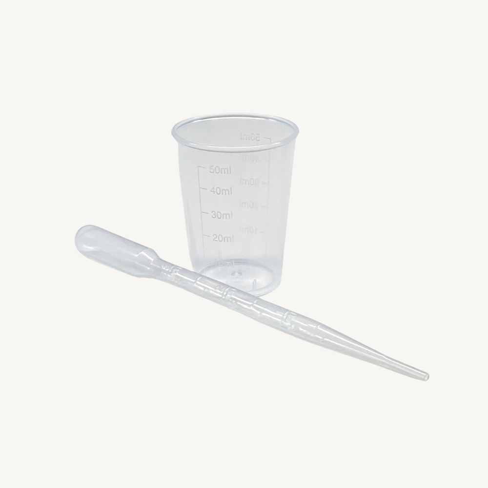 Messbecher und Pipette